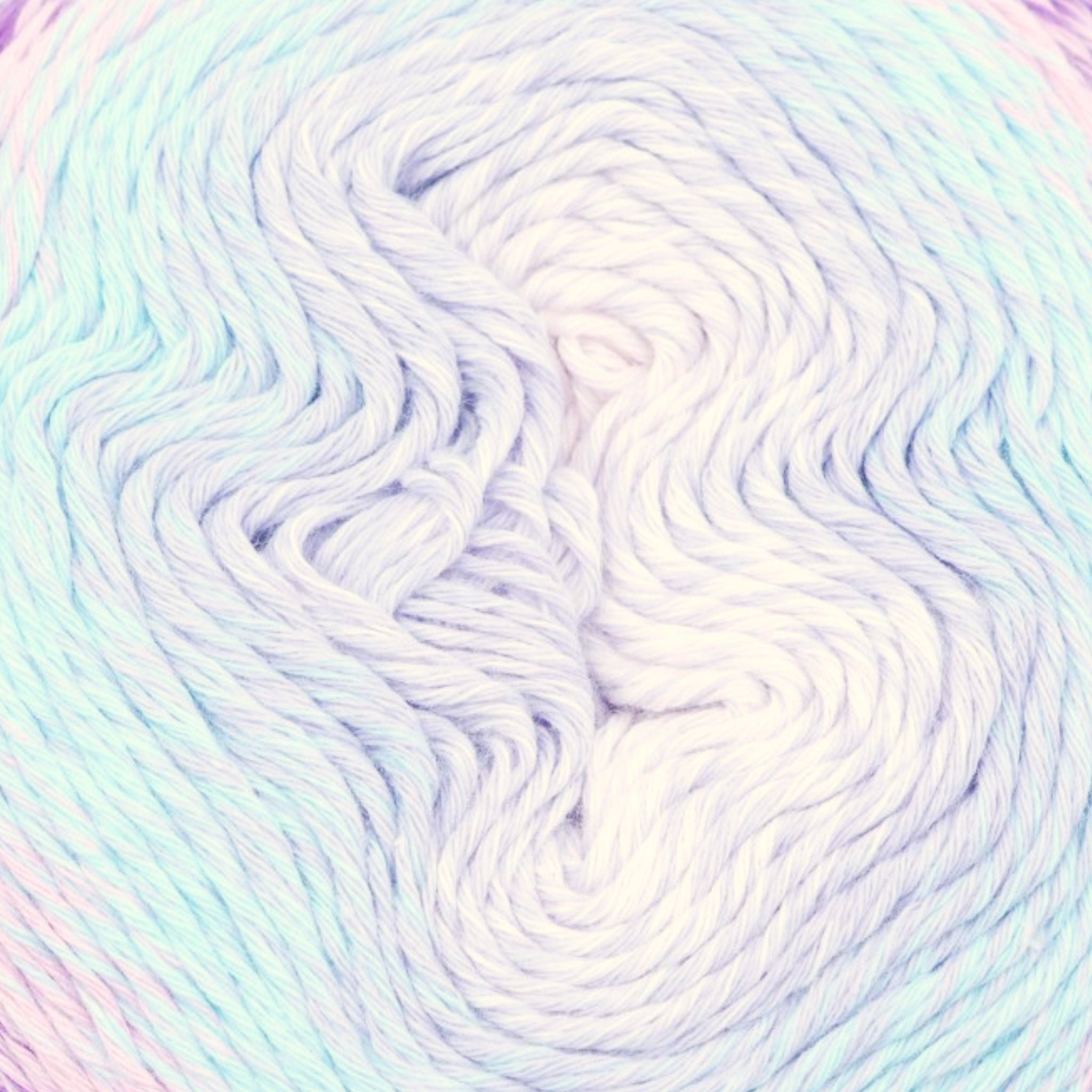 Pastel-colored yarn skein with a soft focus effect in size 1 super fine yarn