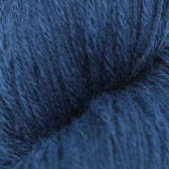A skein of navy blue cotton slub yarn.