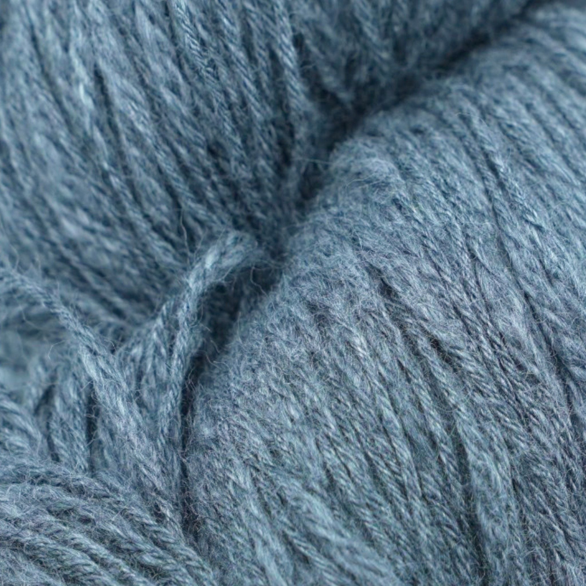 A skein of blue cotton slub yarn.