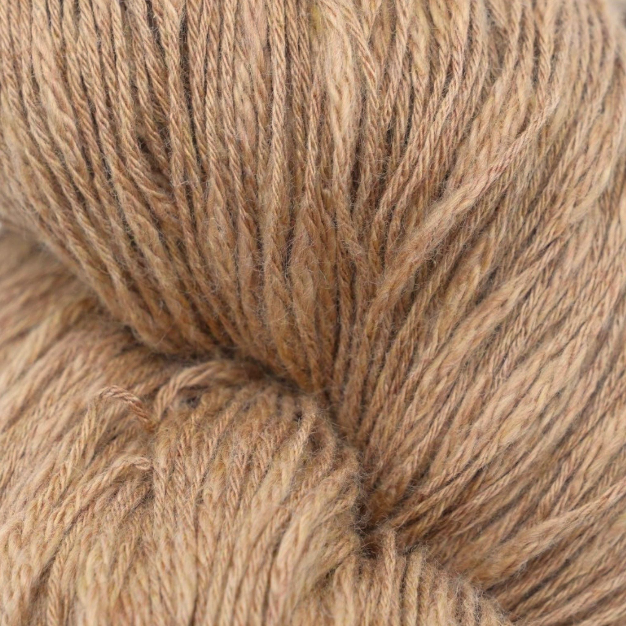 A skein of brown cotton slub yarn.