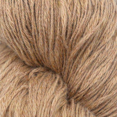 A skein of brown cotton slub yarn.