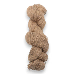 A skein of brown cotton slub yarn.
