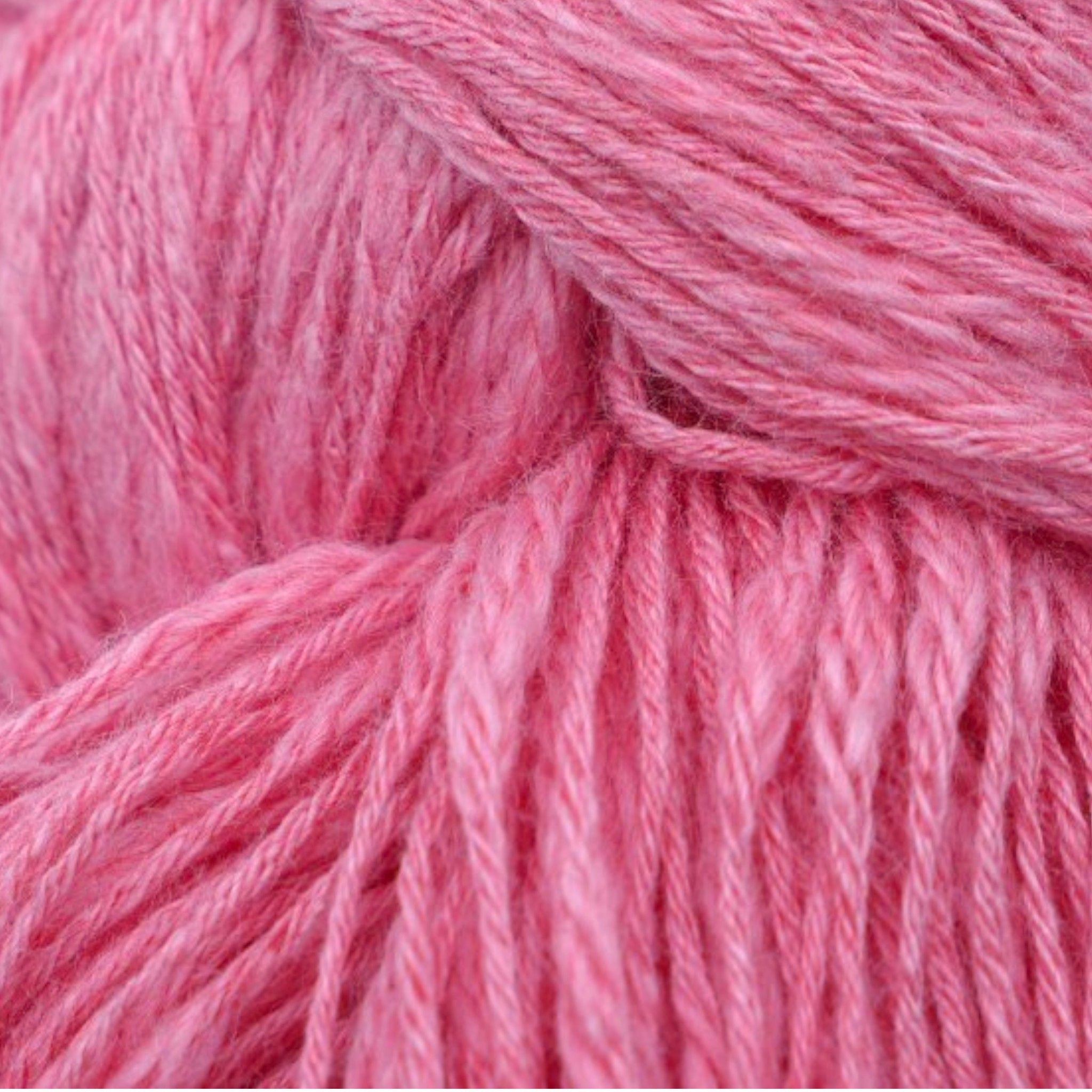 A skein of pink cotton slub yarn.