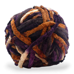 Multicolored skein of yarn with Okey Dokeys label on a white background space dye top view