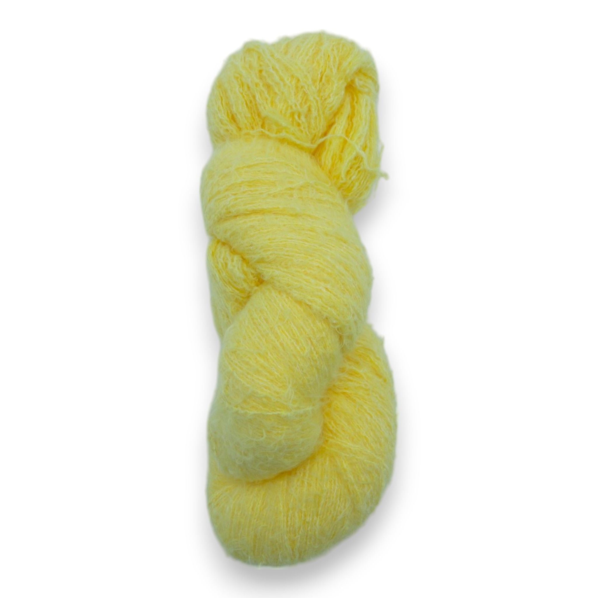 A skein of fuzzy lace yarn in a light yellow color, displayed against a plain background.