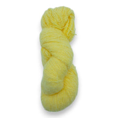 A skein of fuzzy lace yarn in a light yellow color, displayed against a plain background.