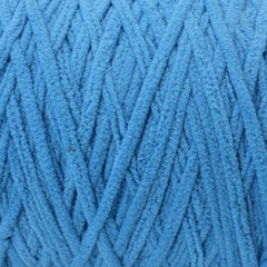 close up of blue Okey Dokey brand chenille yarn with labels showing the yarn type and brand name.