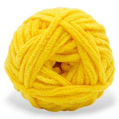 Yellow ball of yarn on a white background