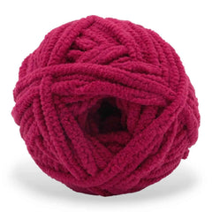 Red skein of yarn on a white background