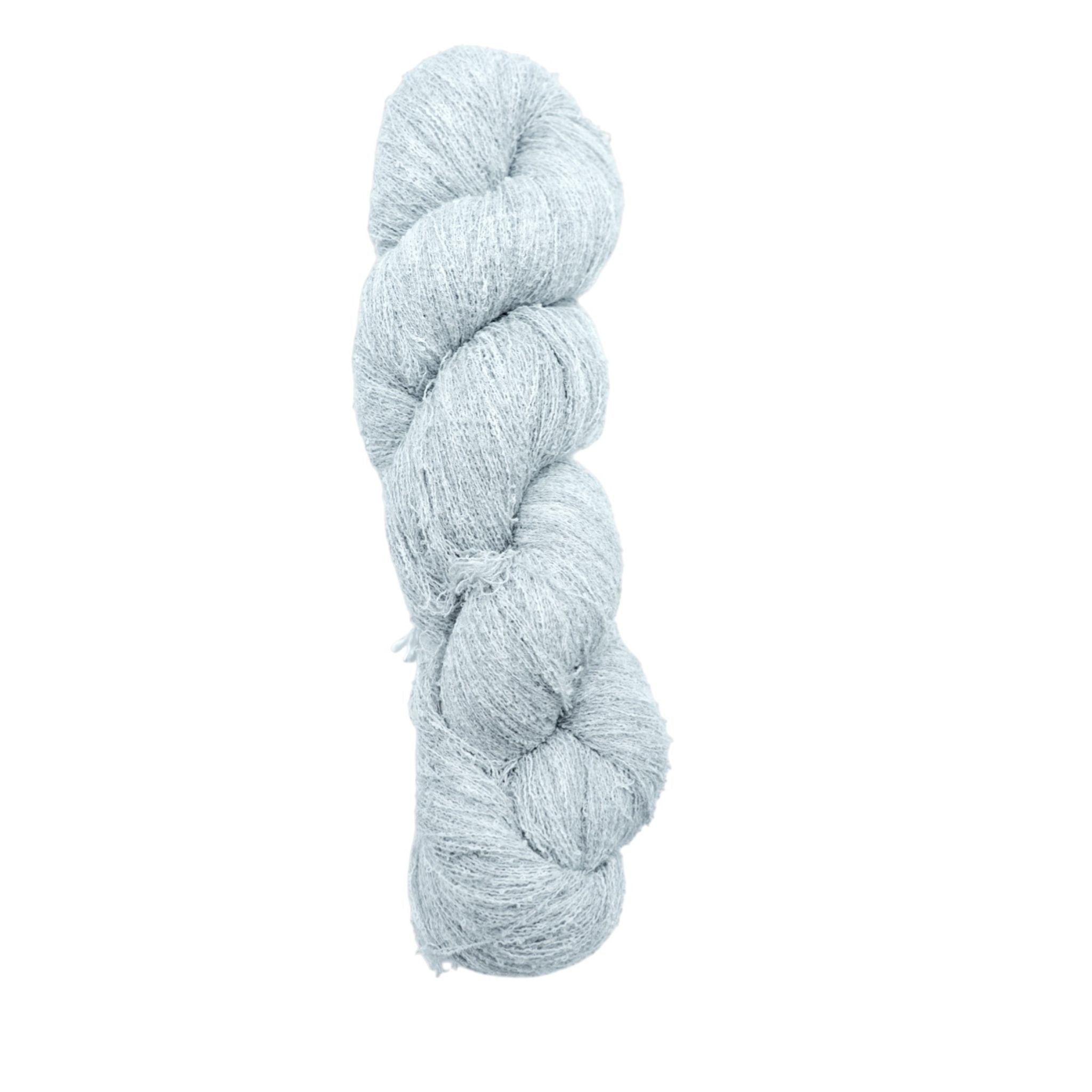 Braided light blue yarn skein on a white background