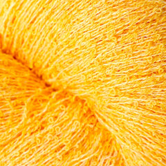 Close-up of bright yellow yarn ball