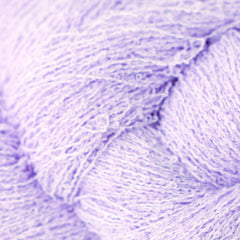 Close-up of purple yarn with a textured looped surface