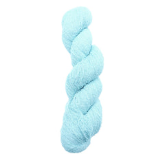 Light blue skein of yarn on a white background