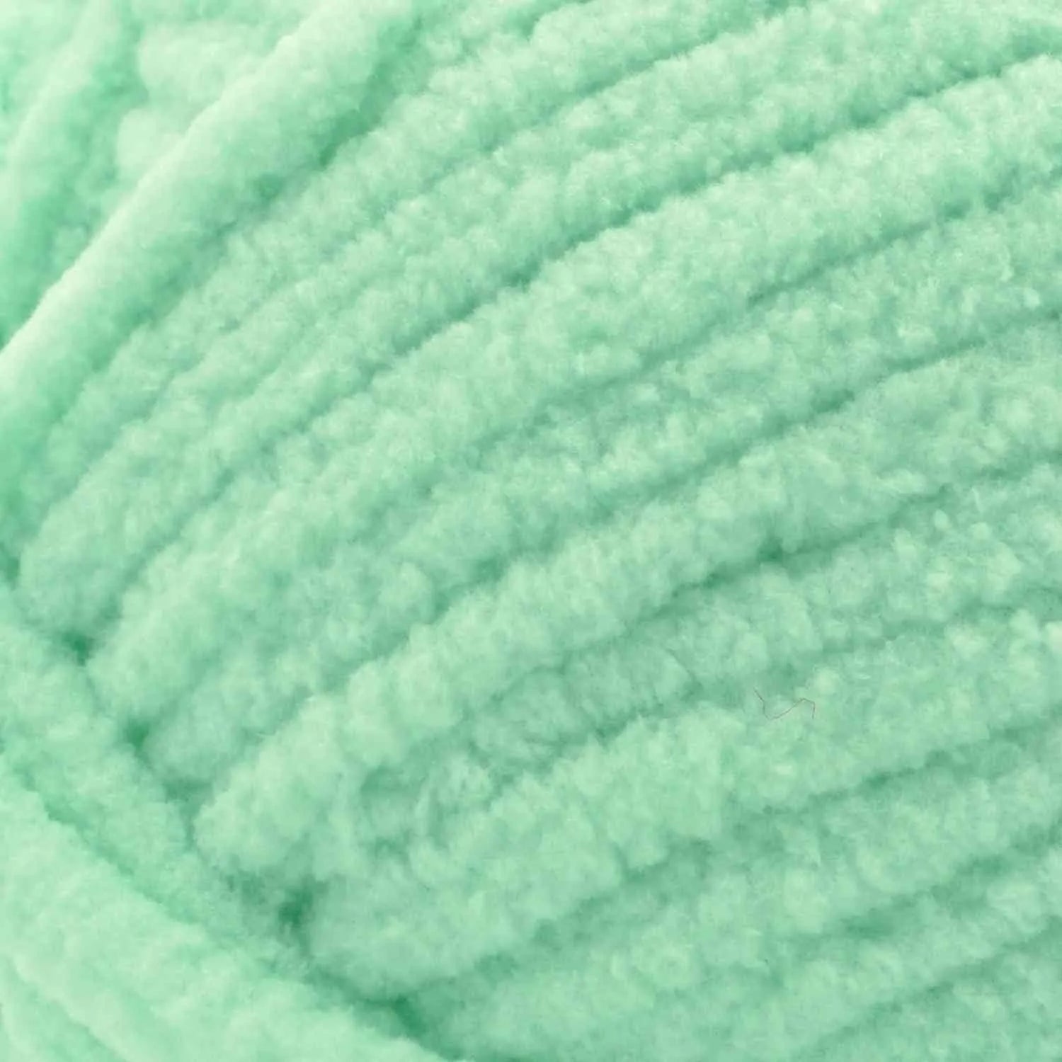 Close-up of light green yarn ball