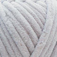 a skein of size 7 jumbo yarn in a grey color