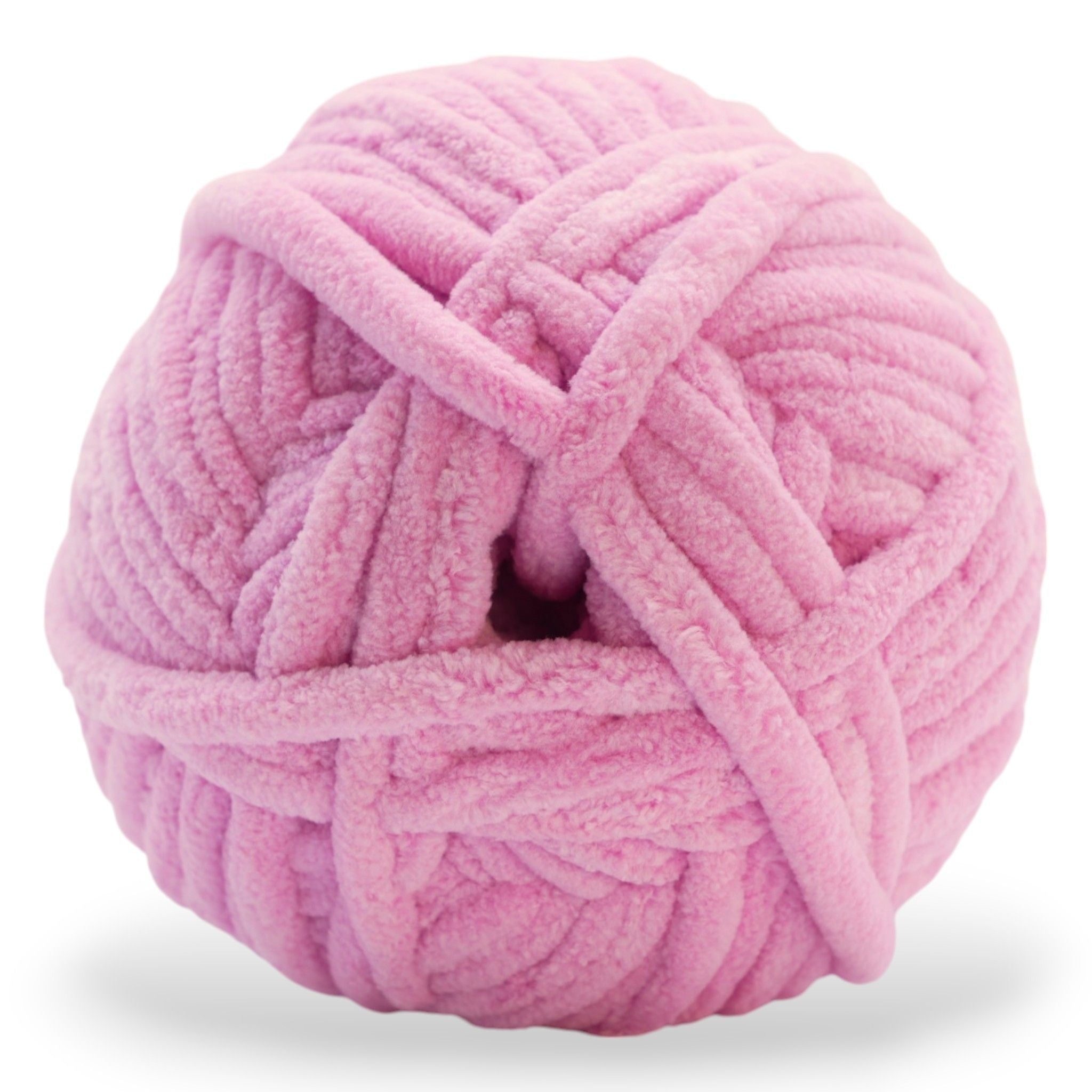jumbo weight yarn in a pink tone on its side showing its super soft texture