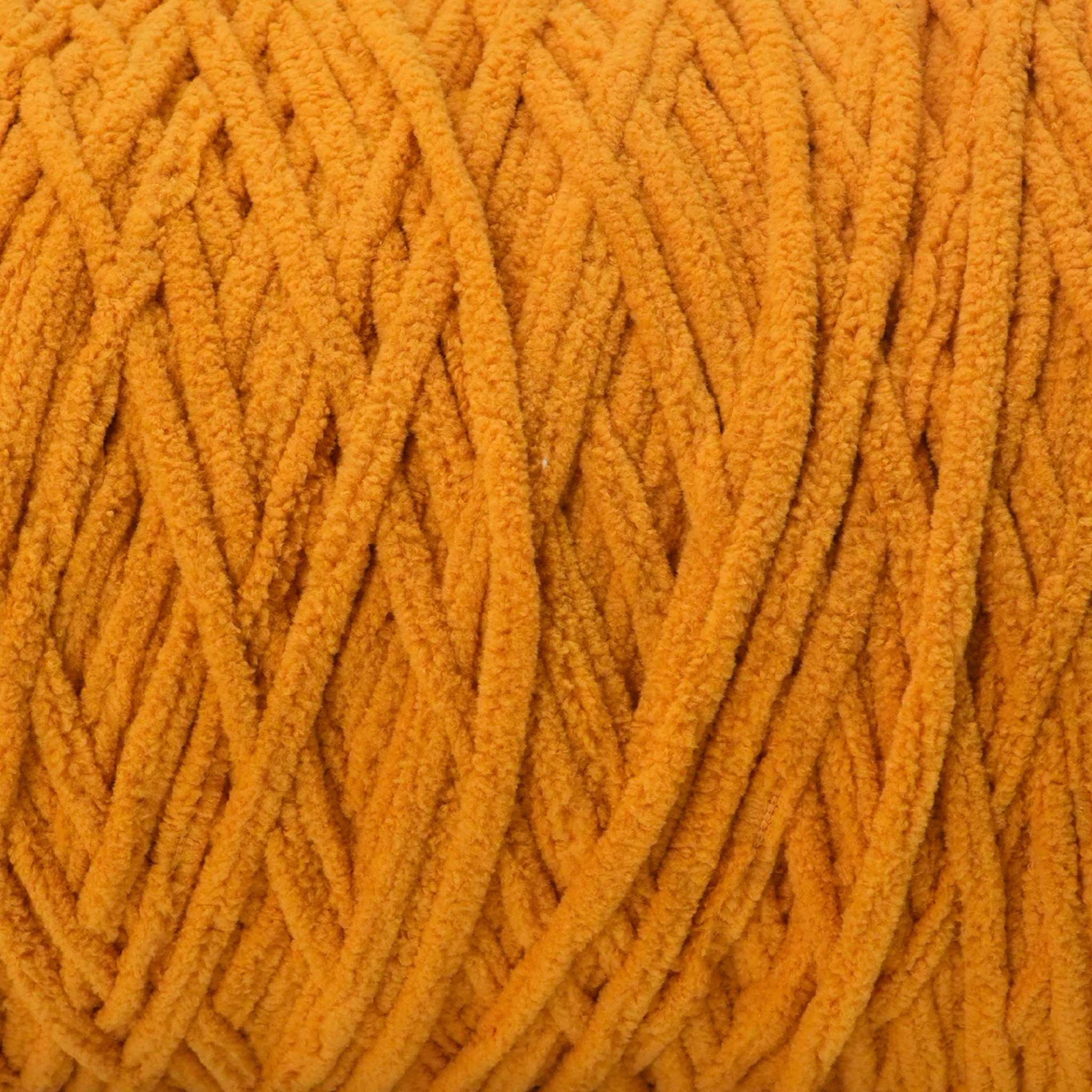 detailed image of our light pale orange that is super soft yarn