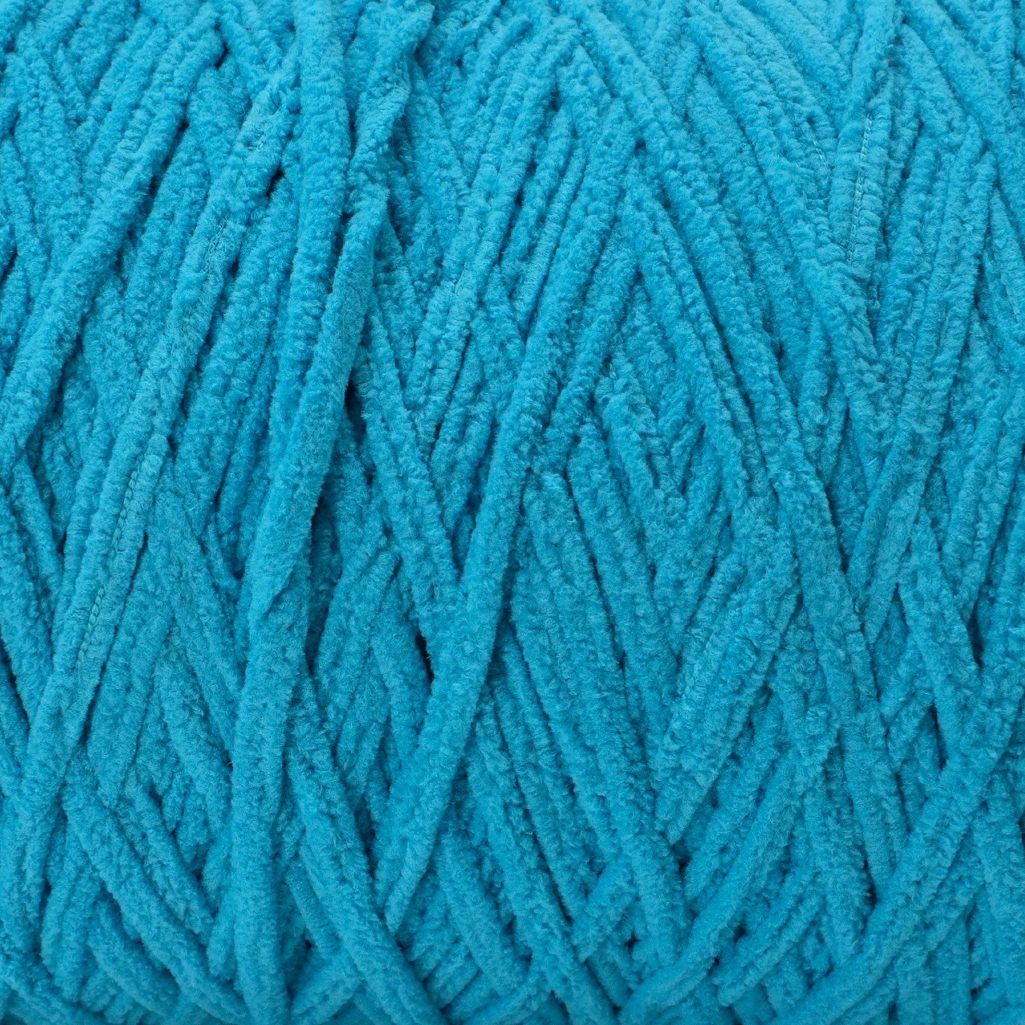 deep aqua blue chenille yarn made from 100% polyester thats super soft.