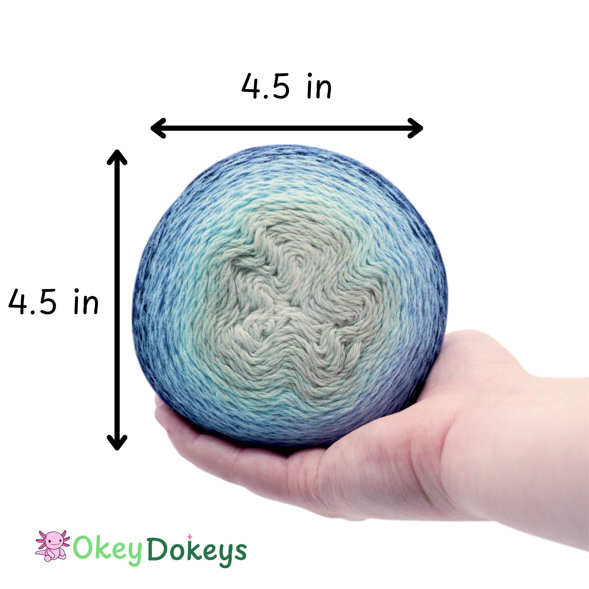 Ball of yarn held in a hand with dimensions labeled, Okey Dokeys brand visible