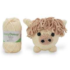 cute amigurumi highland cow in chenille yarn
