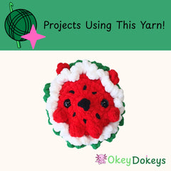 Crocheted watermelon toy with red, white, and green colors on a white background, featuring 'Okey Dokeys' branding.