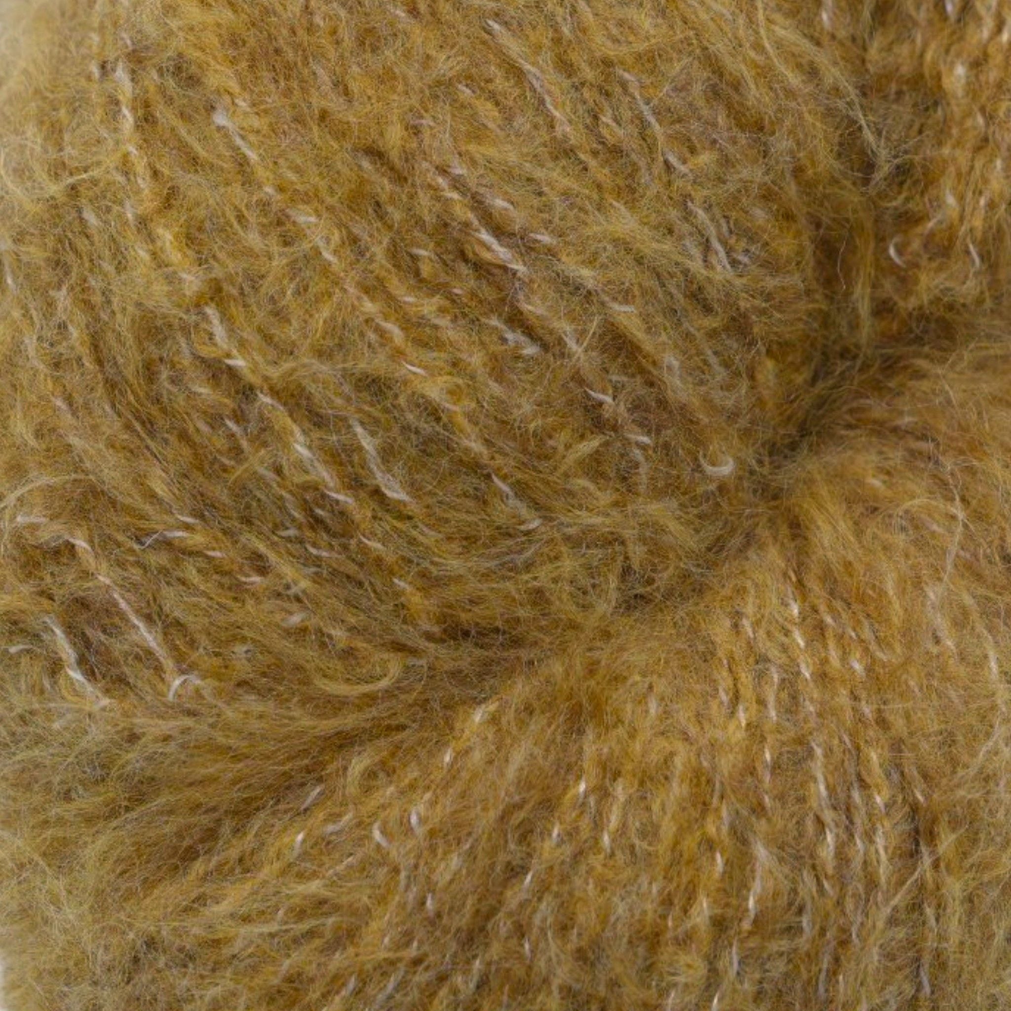 A skein of fuzzy lace yarn in a brown, displayed against a plain background.