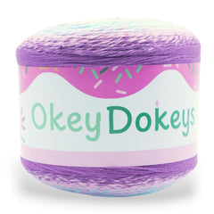 okey dokeys fine cake yarn with a purple color to it