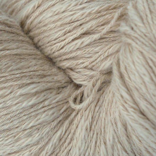 A skein of beige cotton slub yarn.