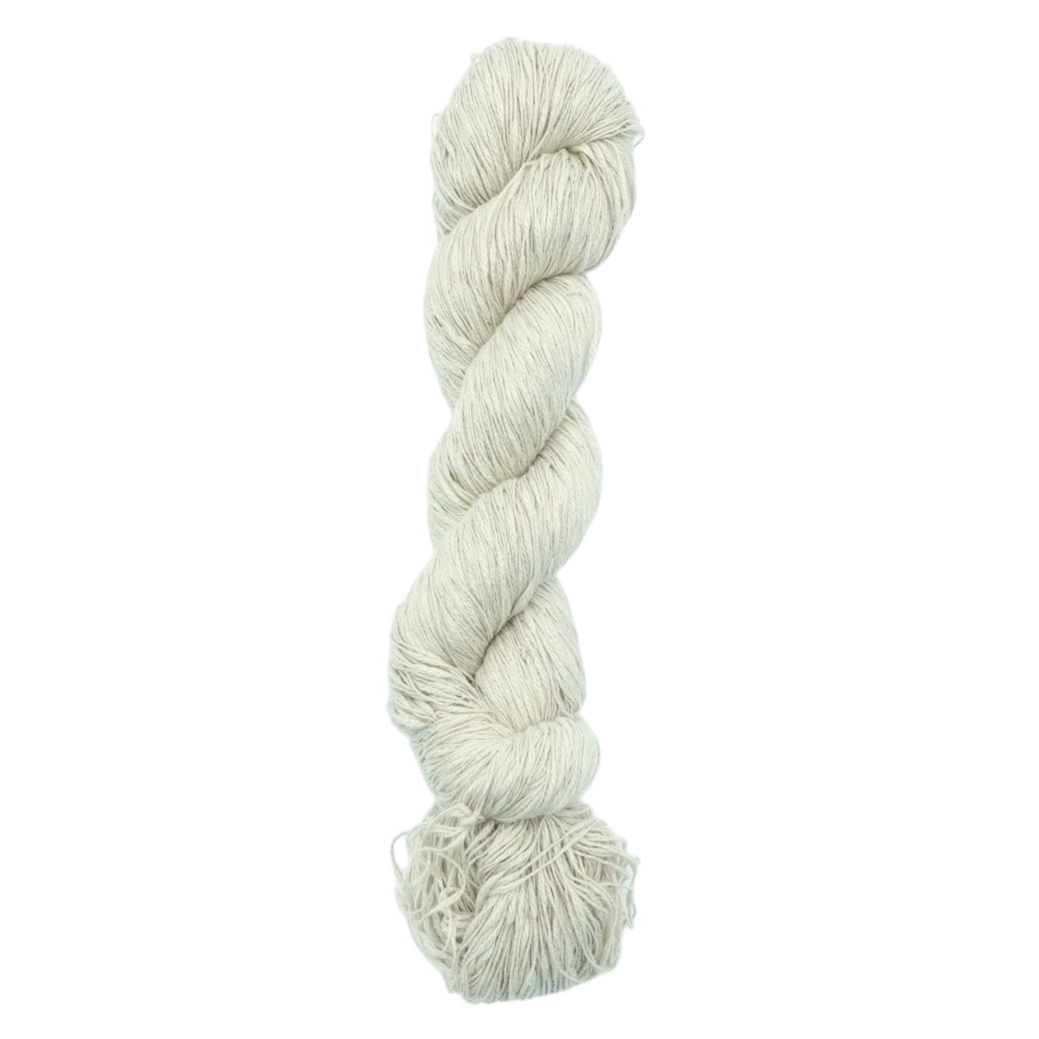 A skein of white cotton slub yarn.