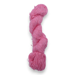 A skein of pink cotton slub yarn.