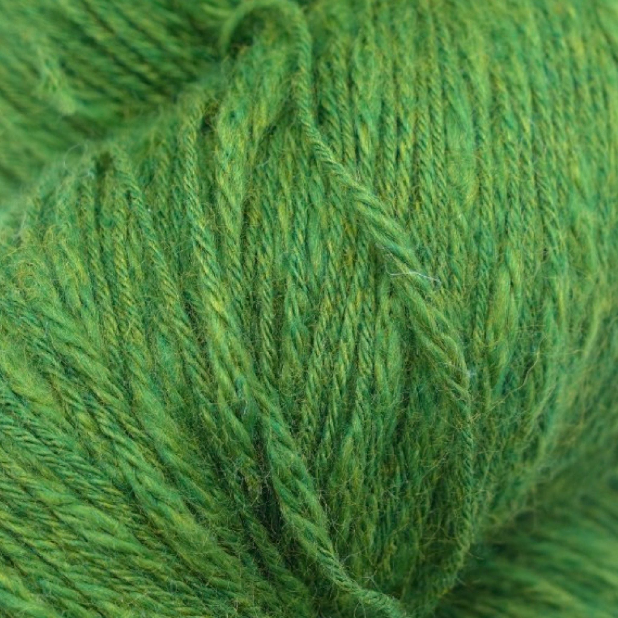A skein of green cotton slub yarn.