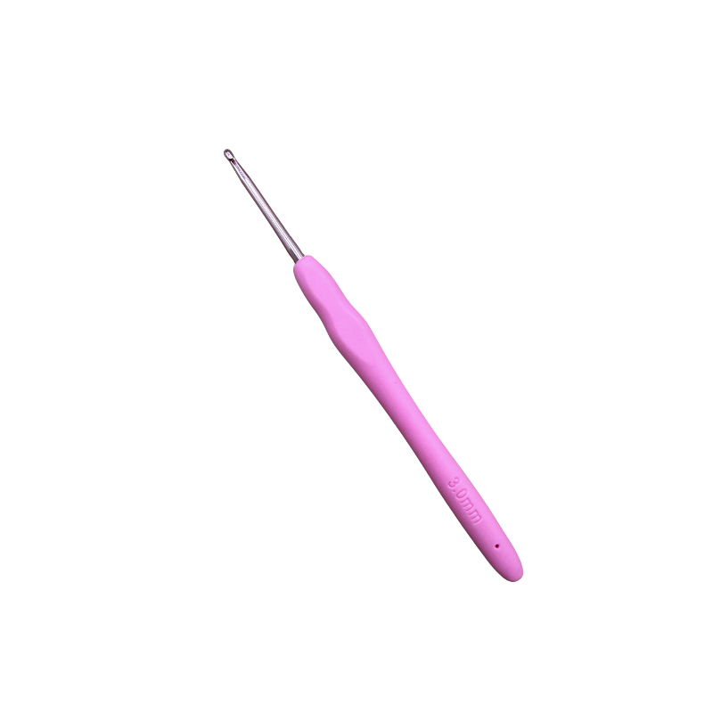 Pink crochet hook on a white background