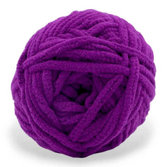 Purple ball of yarn on a white background
