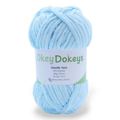 Light blue skein of yarn with 'Okey Dokeys' label on a white background
