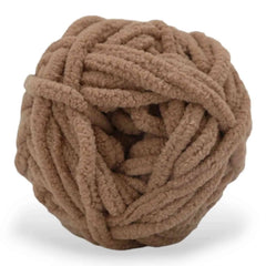 Brown ball of yarn on a white background