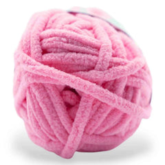 Pink ball of yarn on a white background