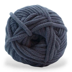 Blue skein of yarn on a white background