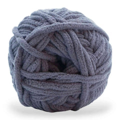 Large ball of gray yarn on a white background