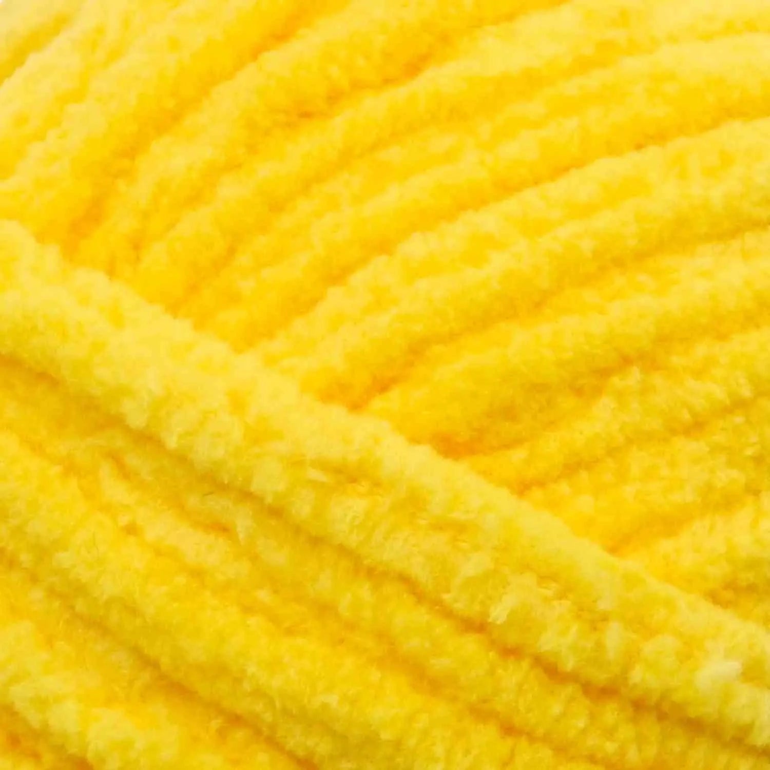 Close-up of bright yellow yarn