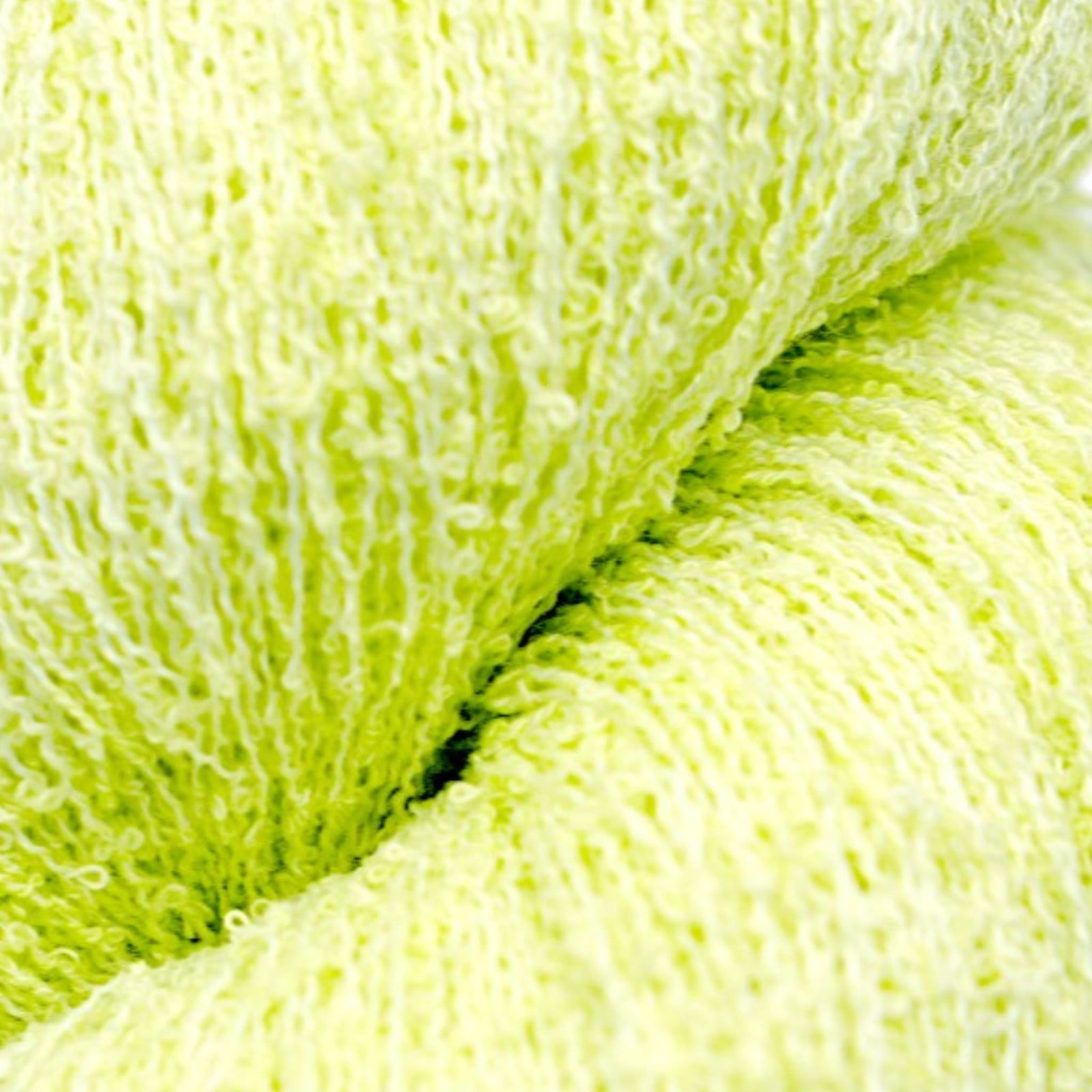 close up of yellow boucle yarn for knitting 