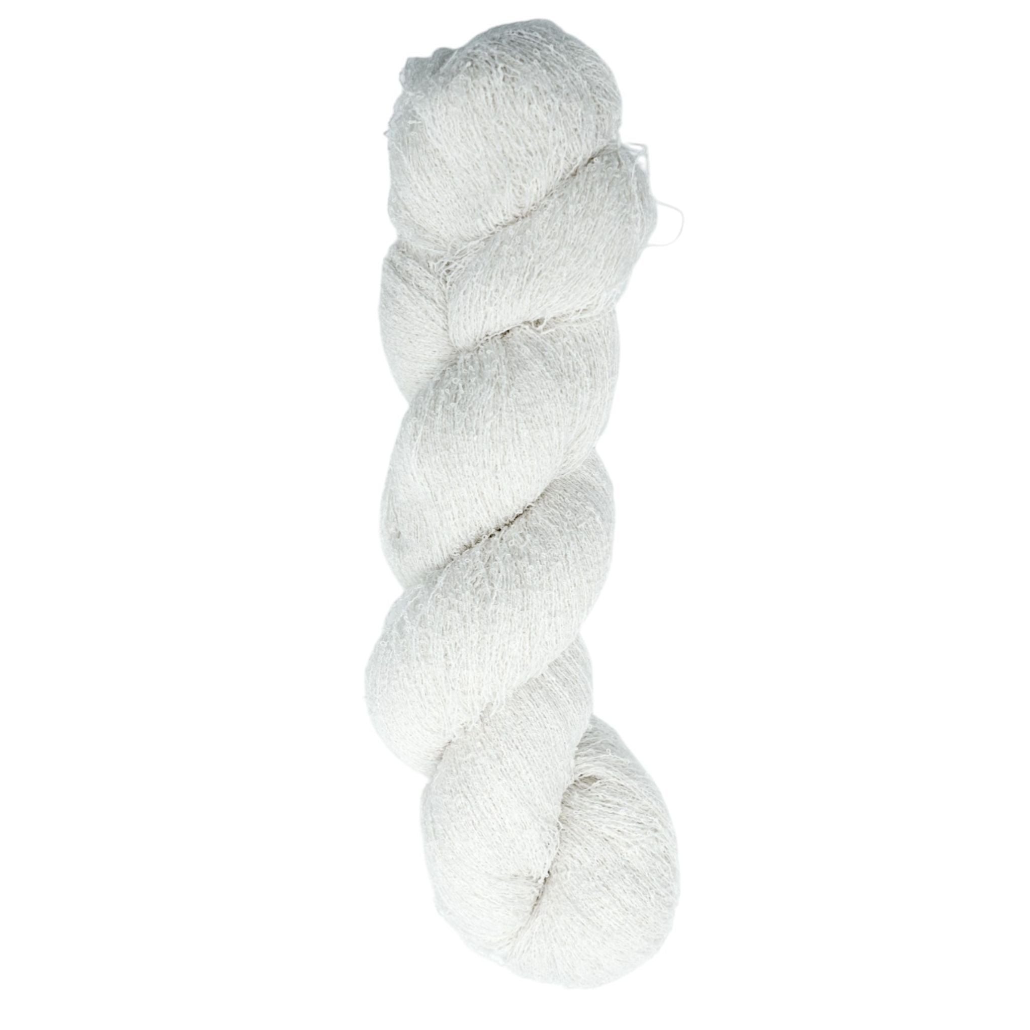 ball of light colored yarn for knitting with a looped texture