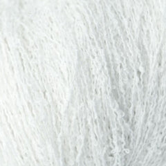 close up of white fluffy boucle yarn 