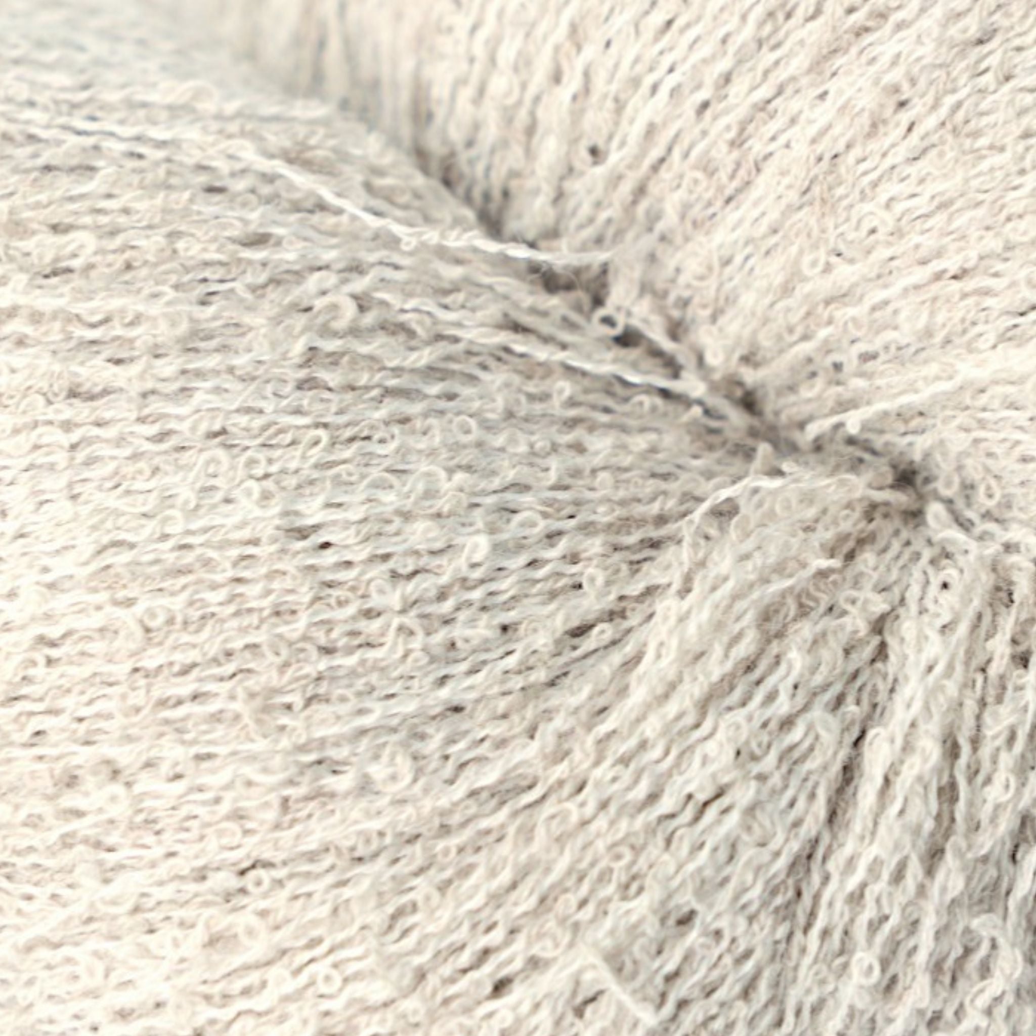 Close-up of beige yarn ball