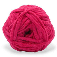 Pink skein of yarn on a white background
