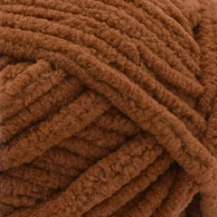 Close-up of a ball of brown yarn