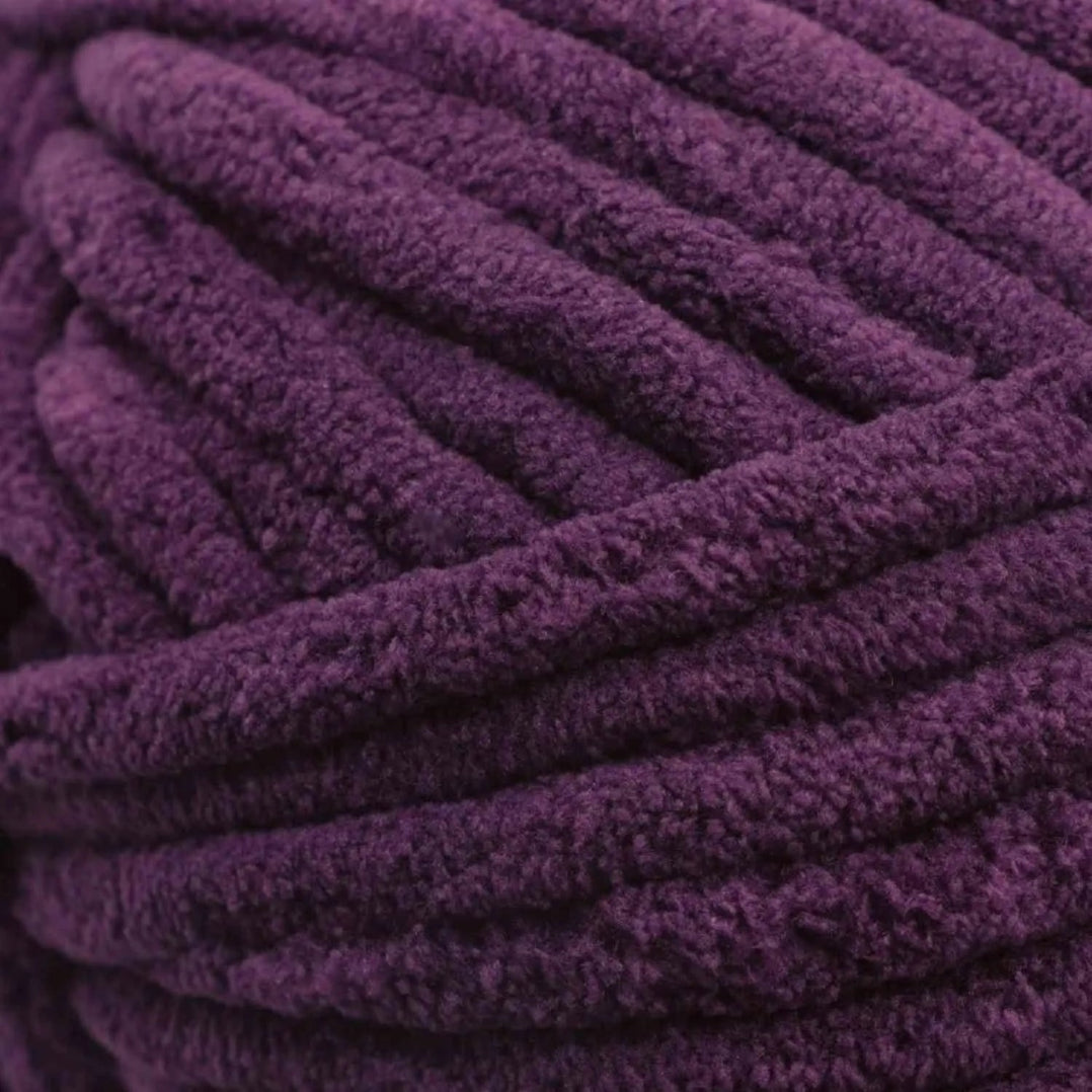 Close-up of a ball of purple yarn