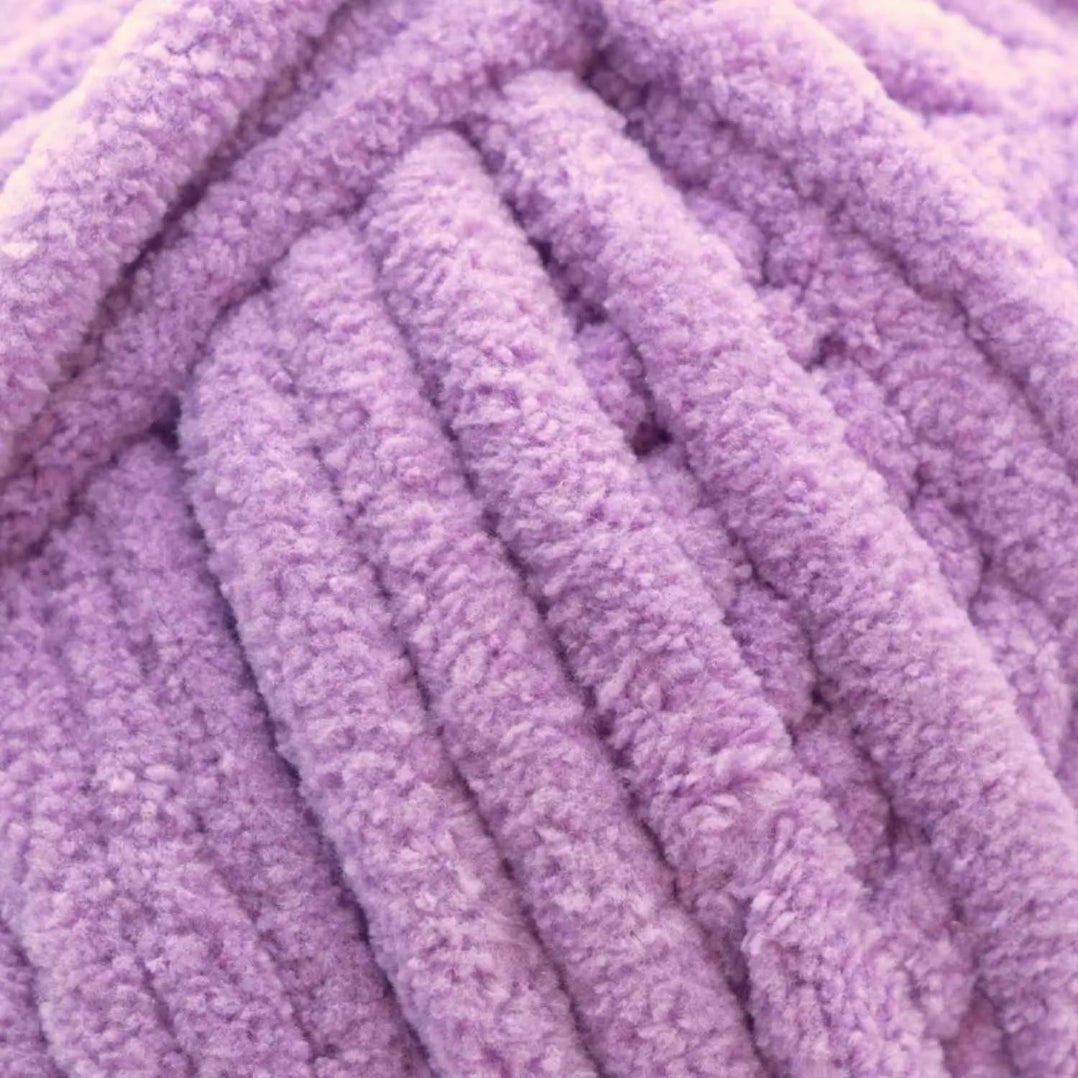 Close-up of a ball of purple yarn