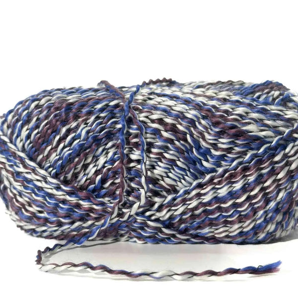 Multicolored skein of yarn on a white background