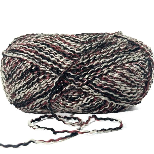 Multicolored skein of yarn on a white background