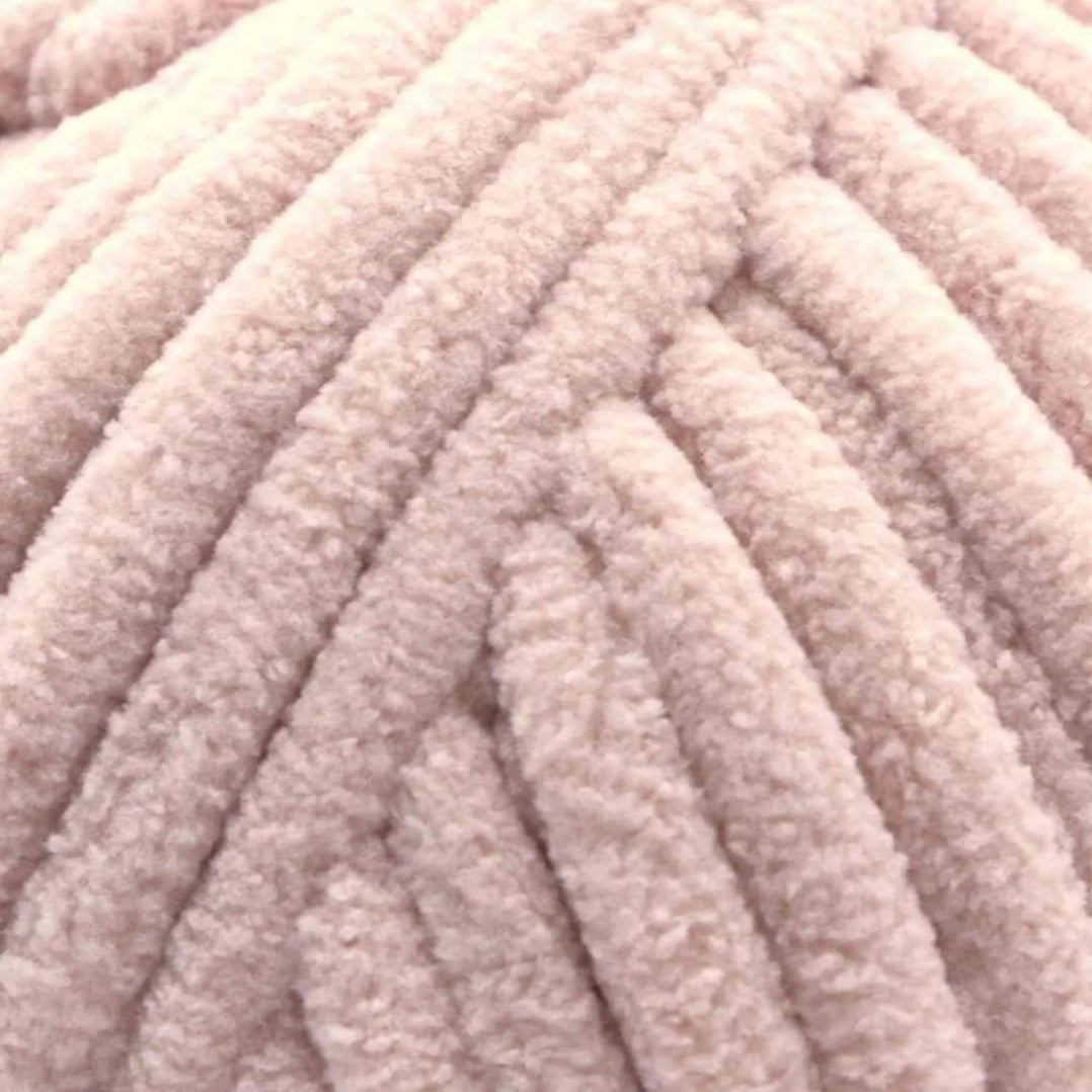 Close-up of pink textured yarn